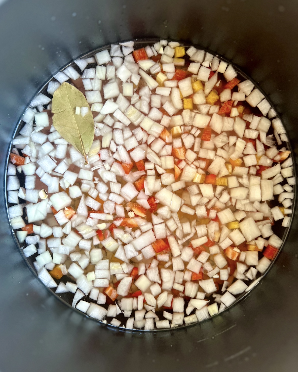 Slow cooker black eyed peas ingredients in a slow cooker.