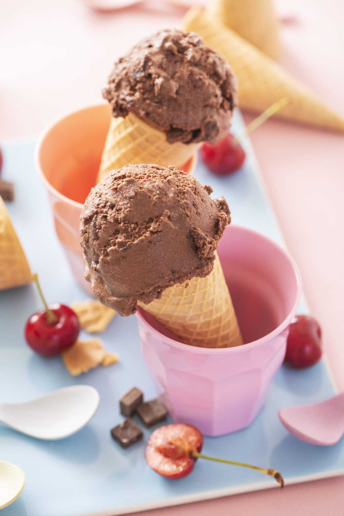 Dairy free chocolate cherry ice cream in cones.