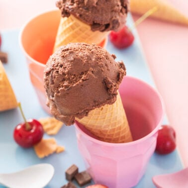 Dairy free chocolate cherry ice cream in cones.