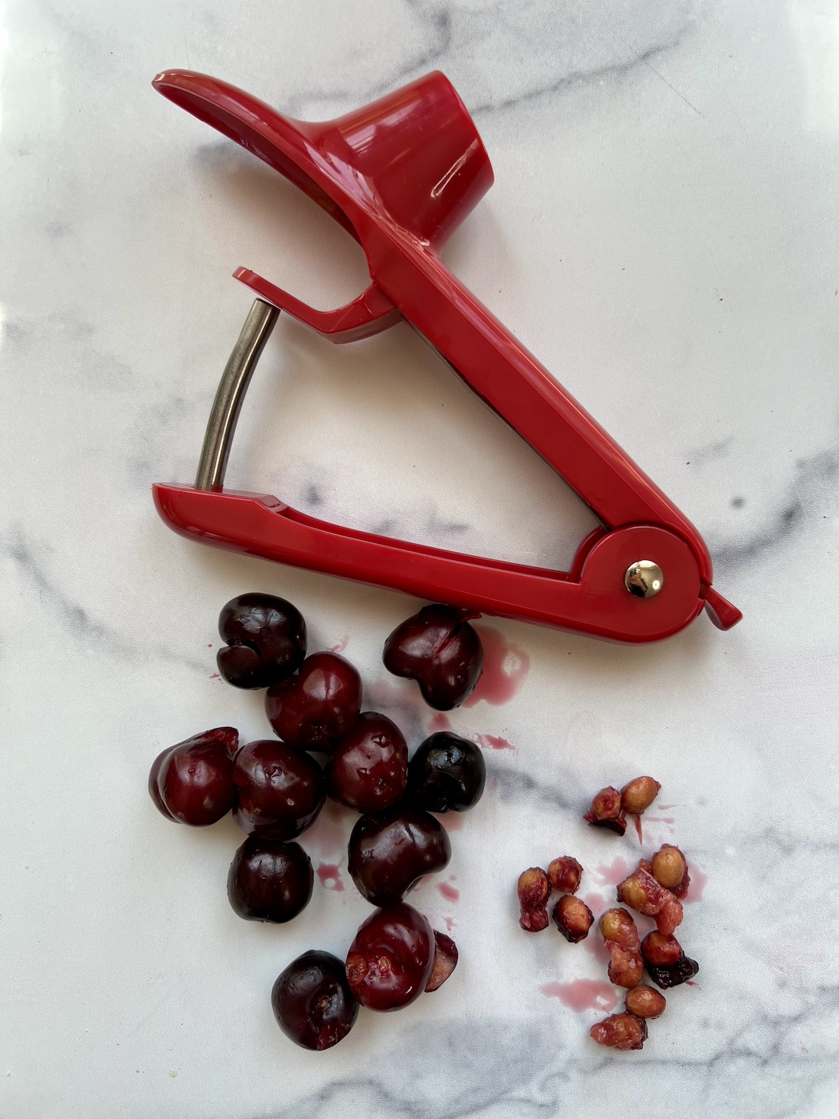 Cherries with cherry pitter.