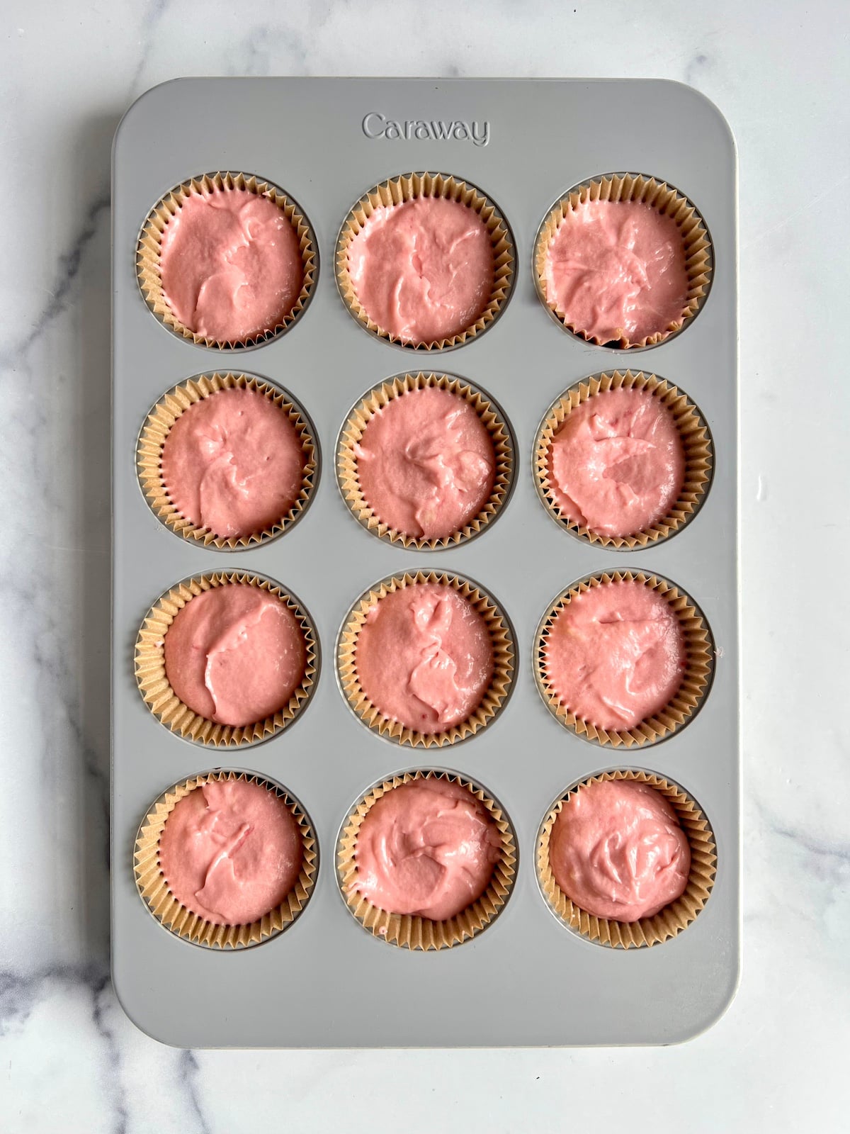Pink cupcakes before baking.
