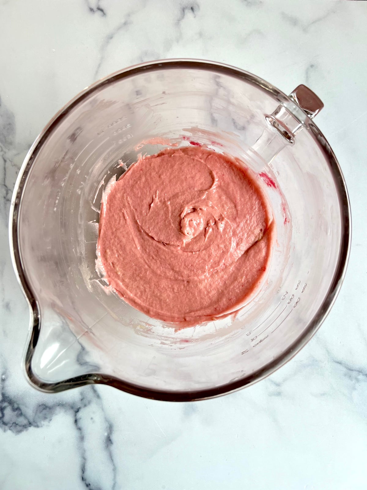 Pink Cupcake batter in a mixing bowl.