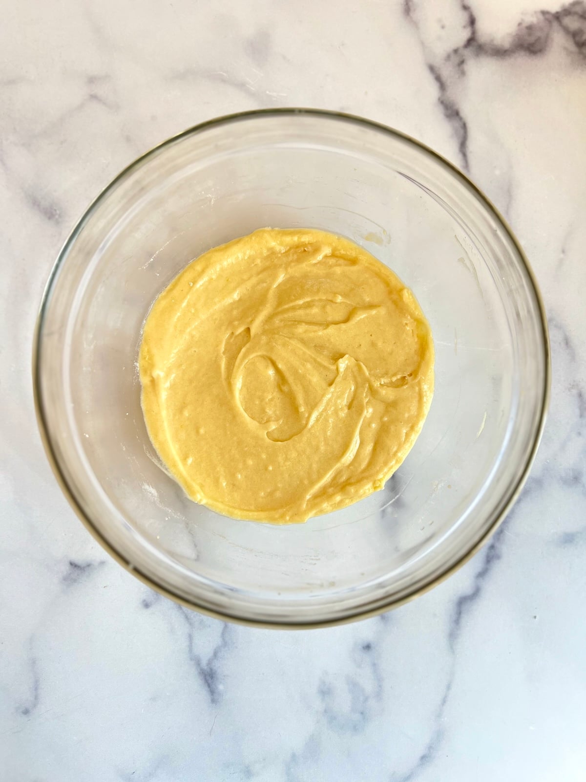 Doughnut batter in a mixing bowl.