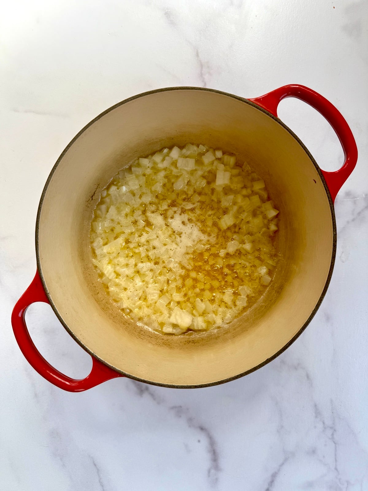 Sauteed onion in a stock pot.