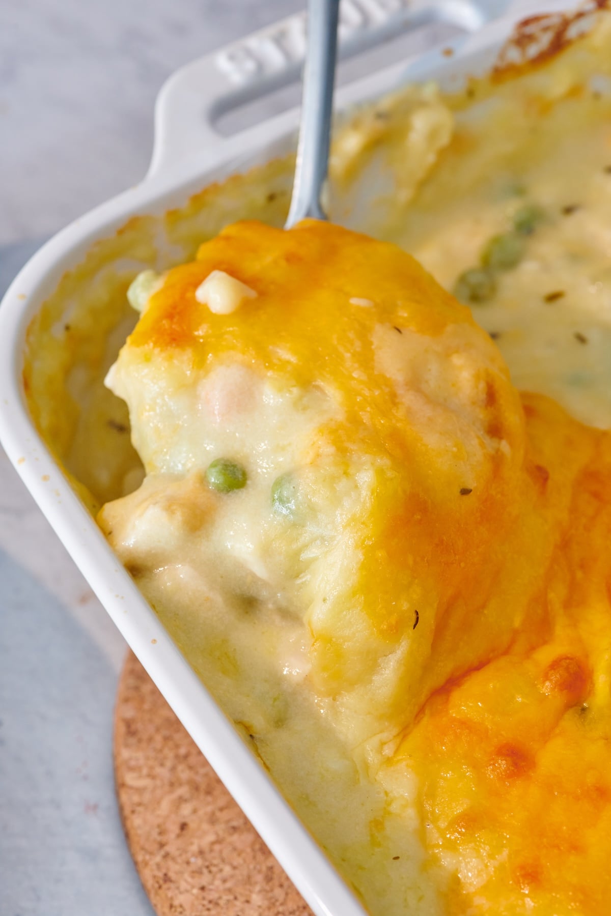 Scooping leftover Thanksgiving turkey shepherd's pie.