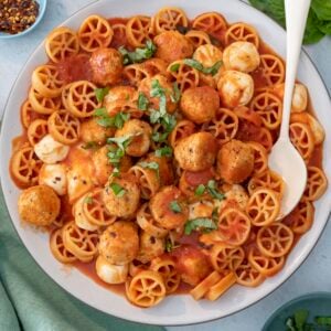 Pasta with tomato sauce and meatballs.