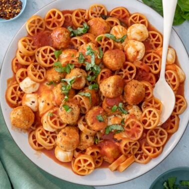 Pasta with tomato sauce and meatballs.