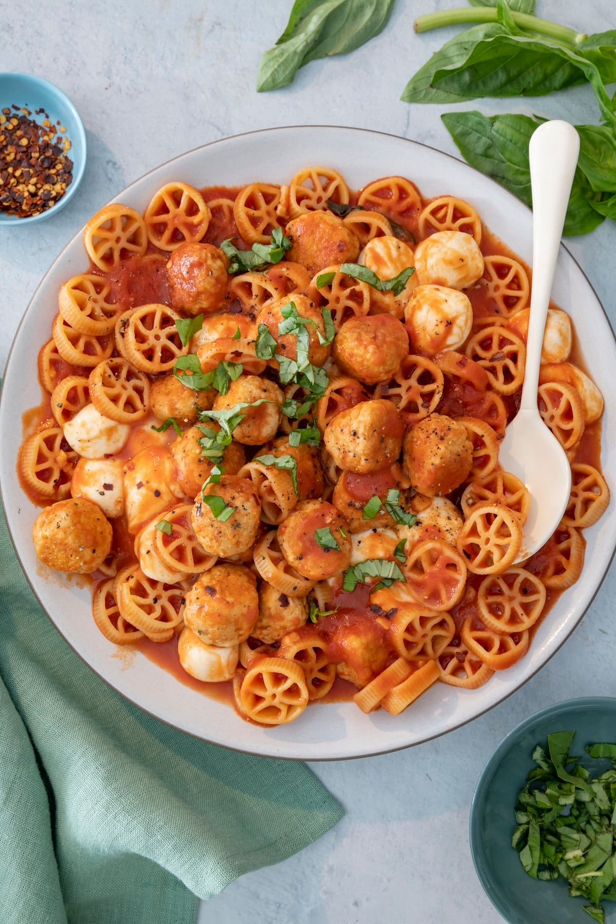 Pasta with tomato sauce and meatballs.