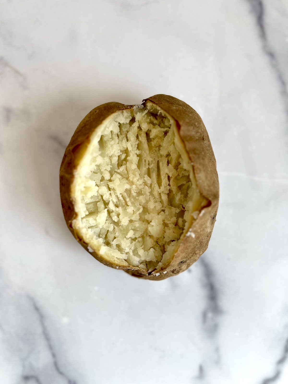 Baked potato with insides mashed.