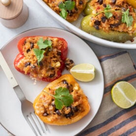 Vegetarian stuffed peppers on a white plate.