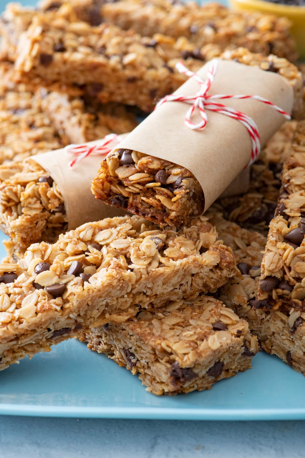 Chocolate Chip Granola Bars wrapped in parchment paper.