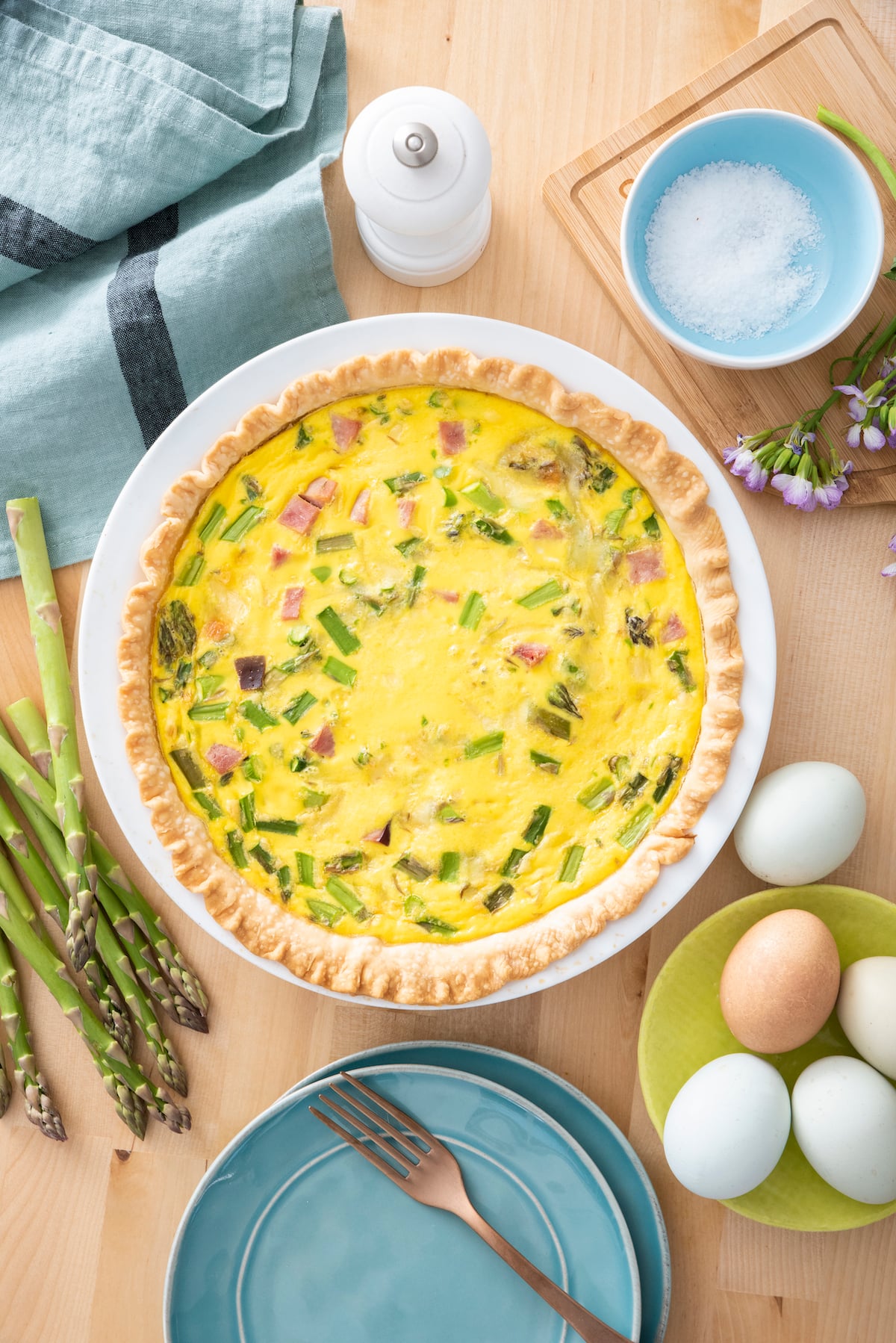 Ham and asparagus quiche ready to serve.