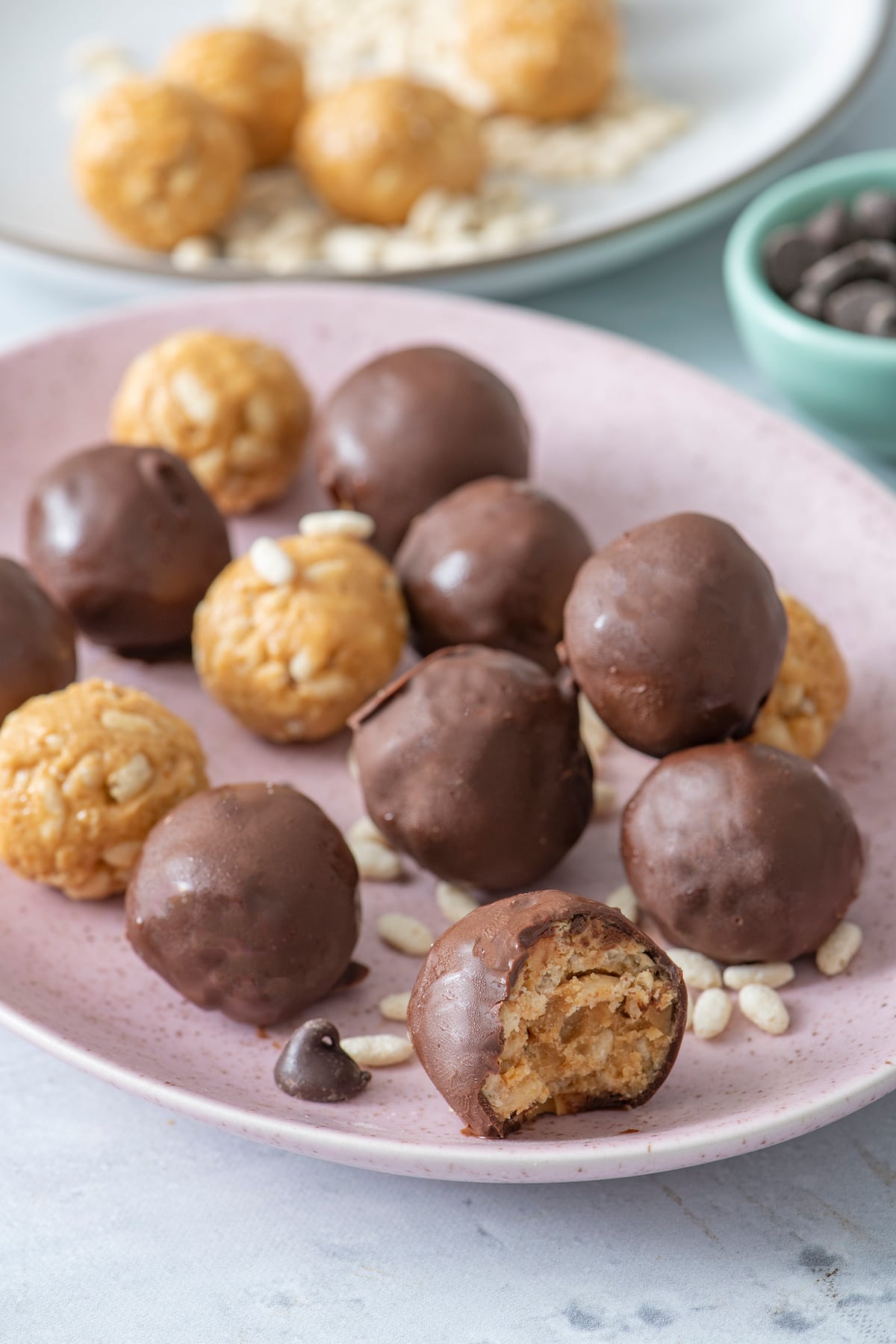 chocolate covered crispy rice bites on a serving plate