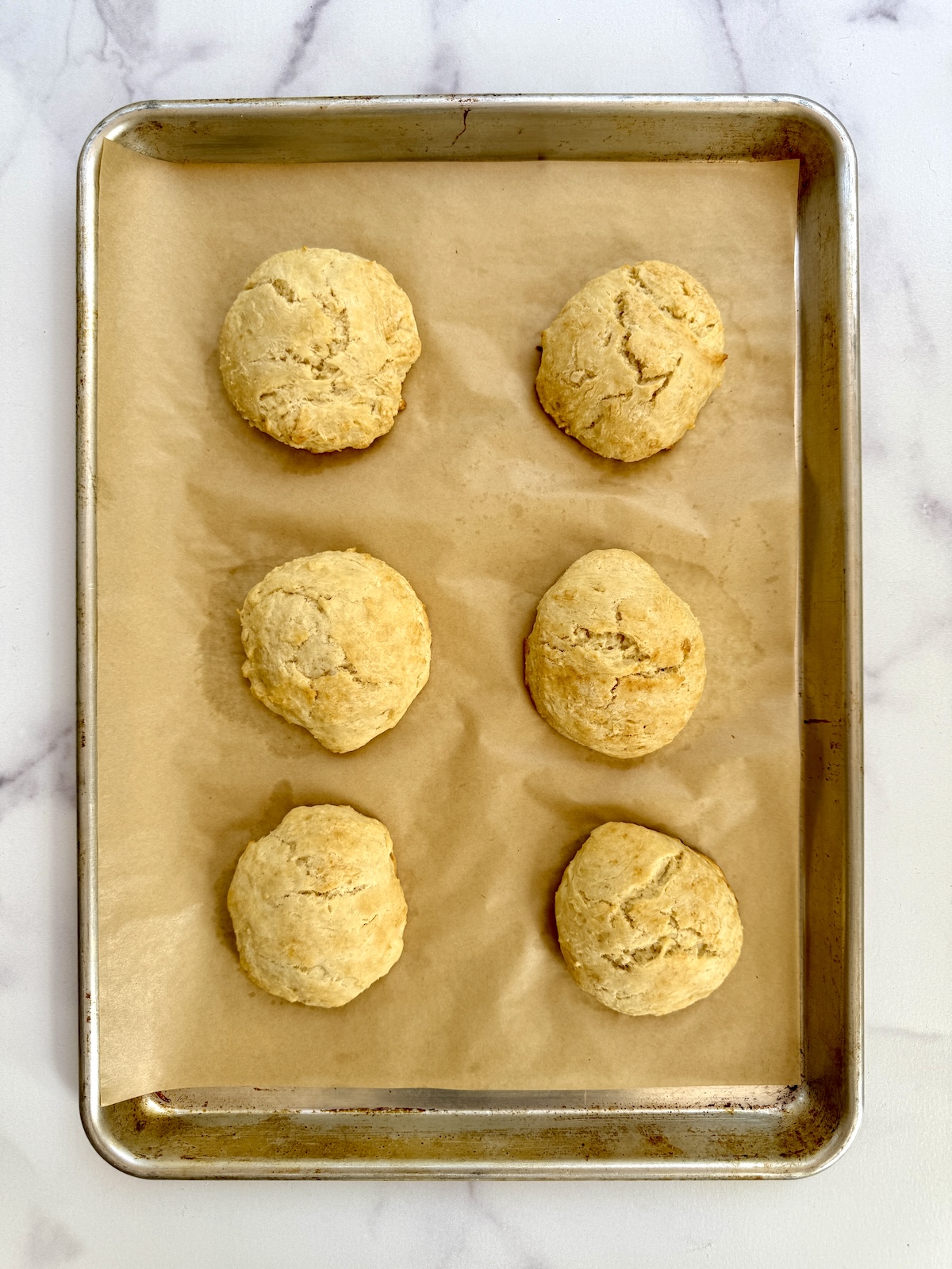Shortcakes on a baking sheet.