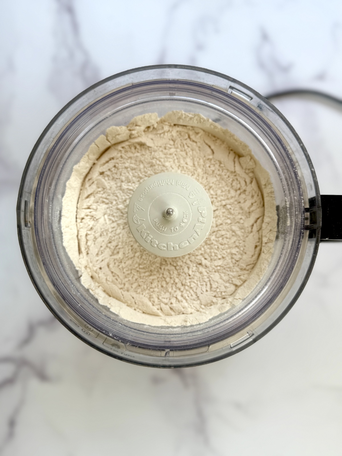 Shortcakes dry ingredients in a food processor.