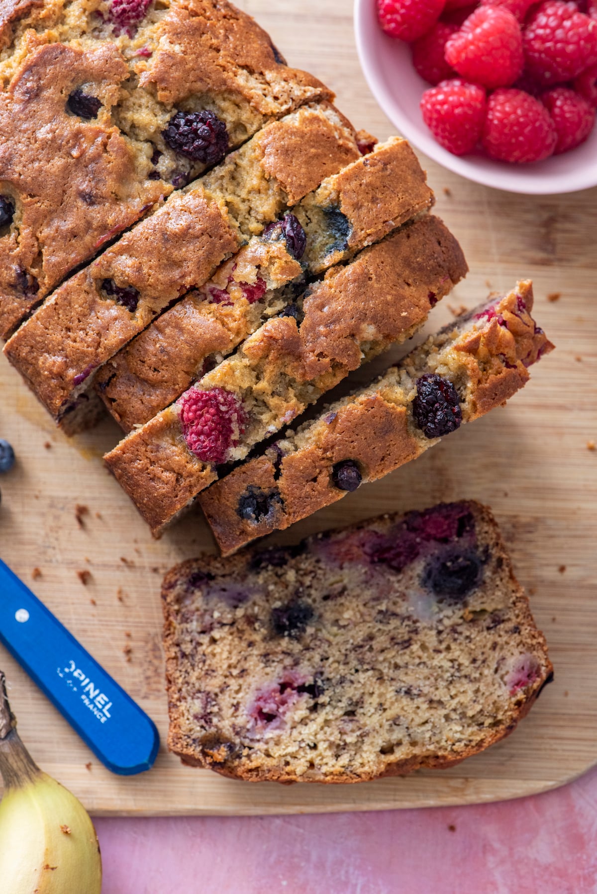 Overhead shot of sliced banana berry bread.