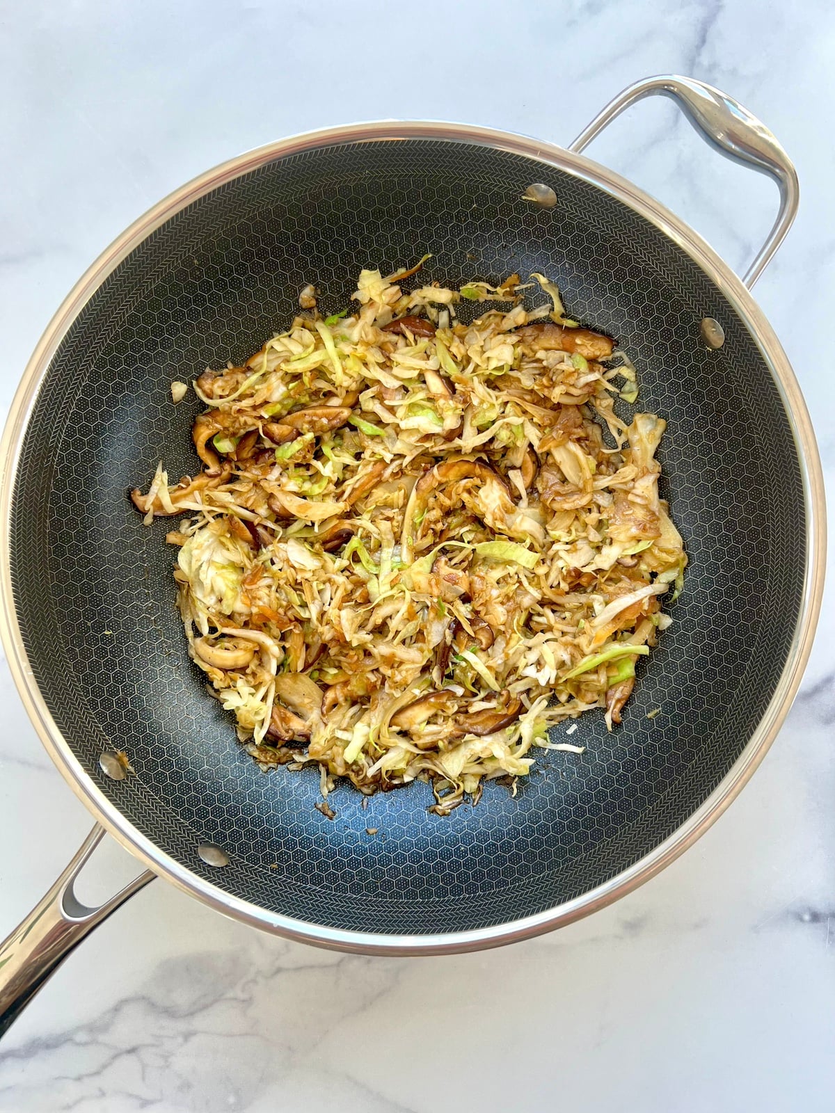 Sauce added to sautéed cabbage and mushrooms.