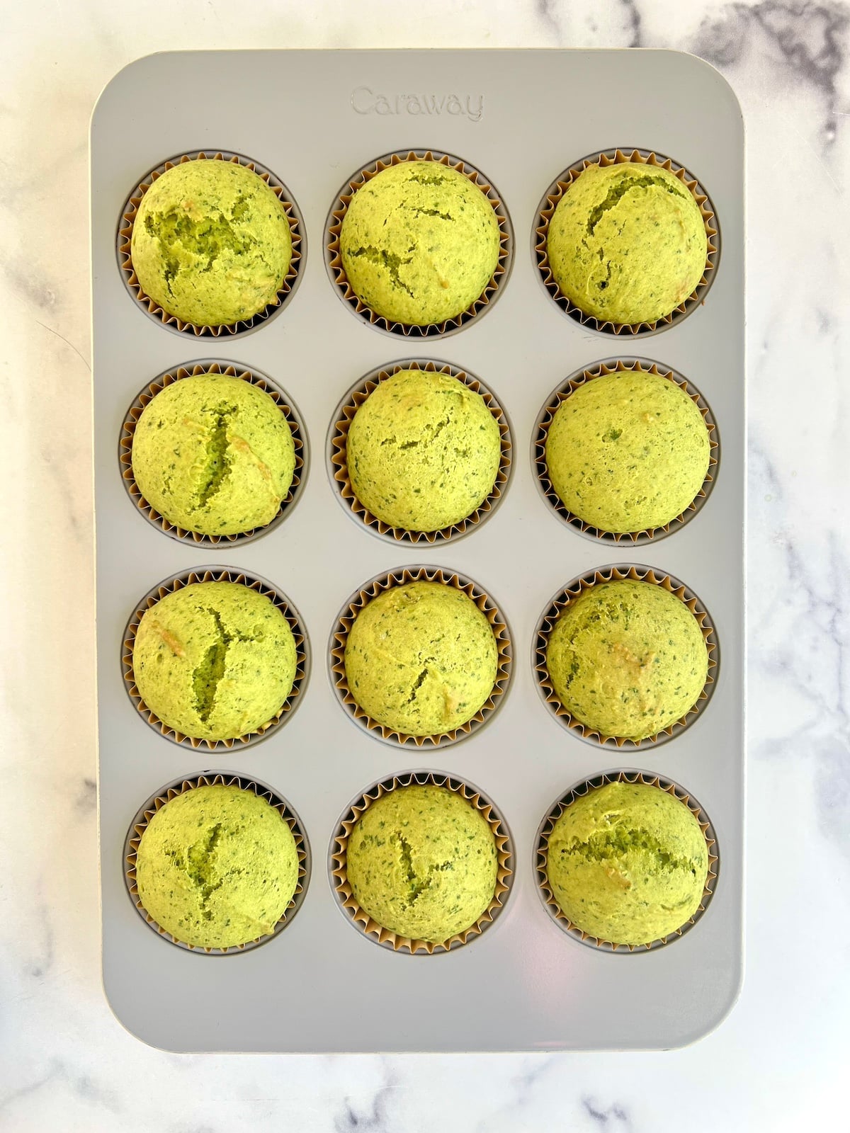 Spinach cake muffins baked in muffin tin.