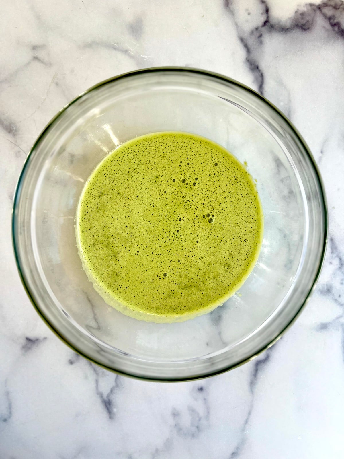 Wet ingredients for spinach muffins.