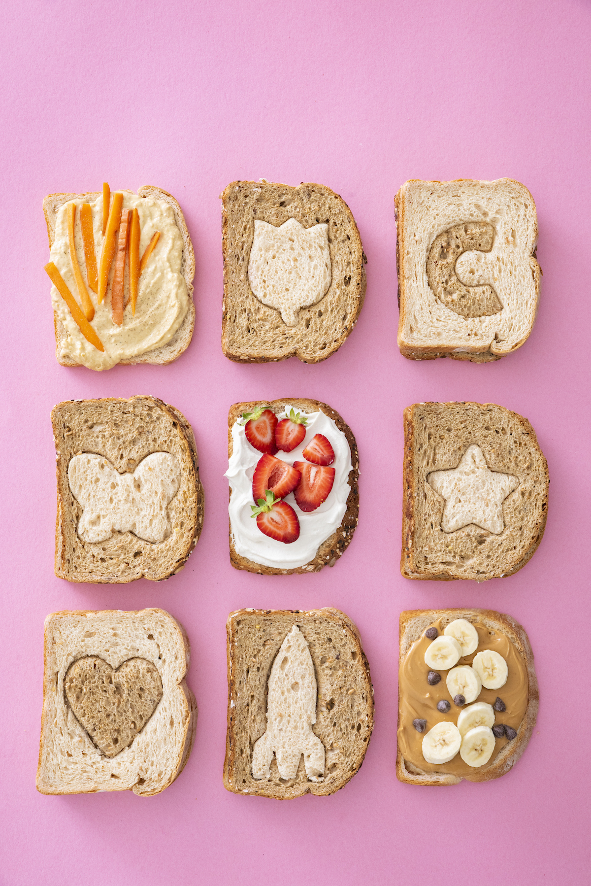 Flat lay of 9 two-tone sandwiches in a grid.