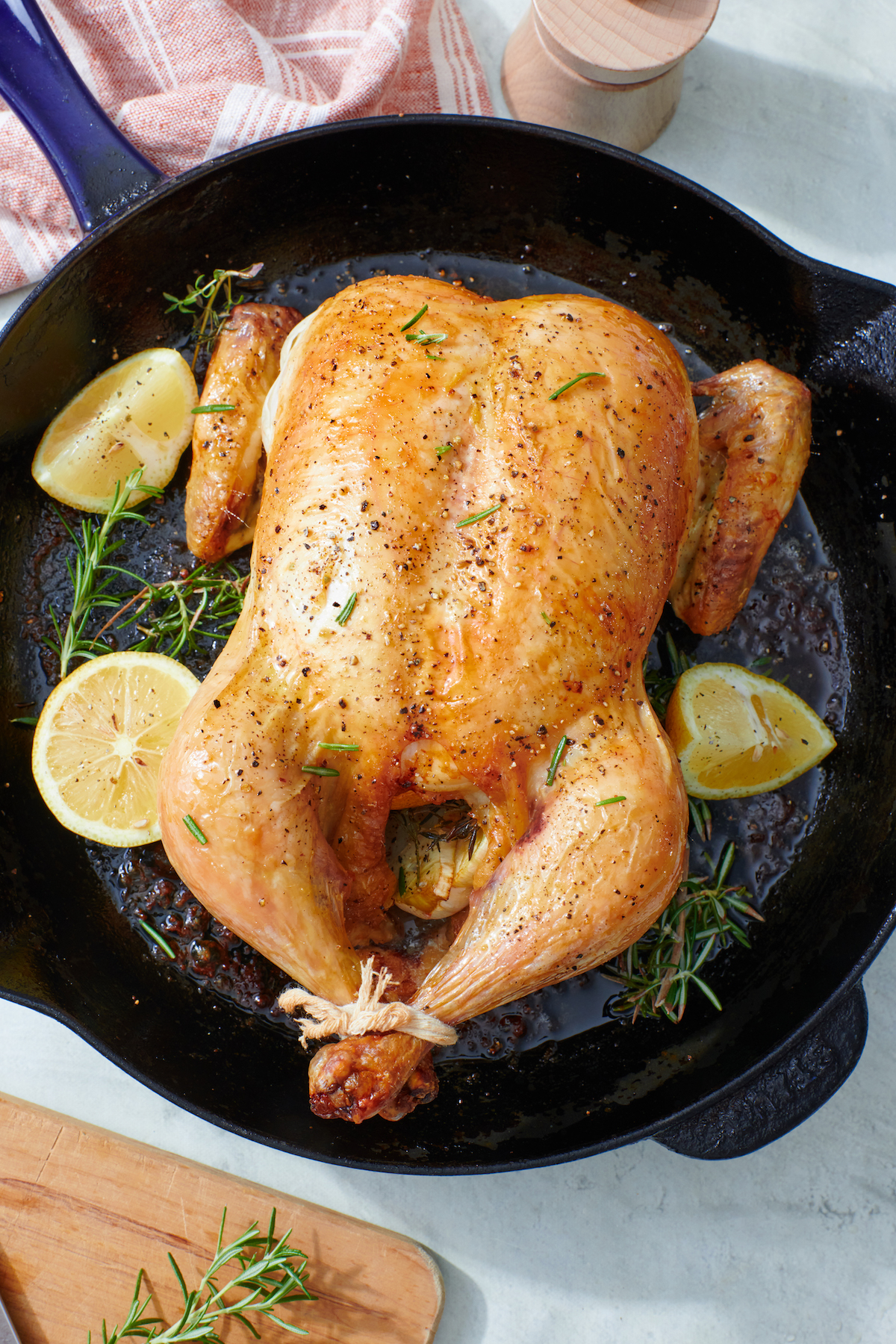Perfect roast chicken in a cast iron skillet.