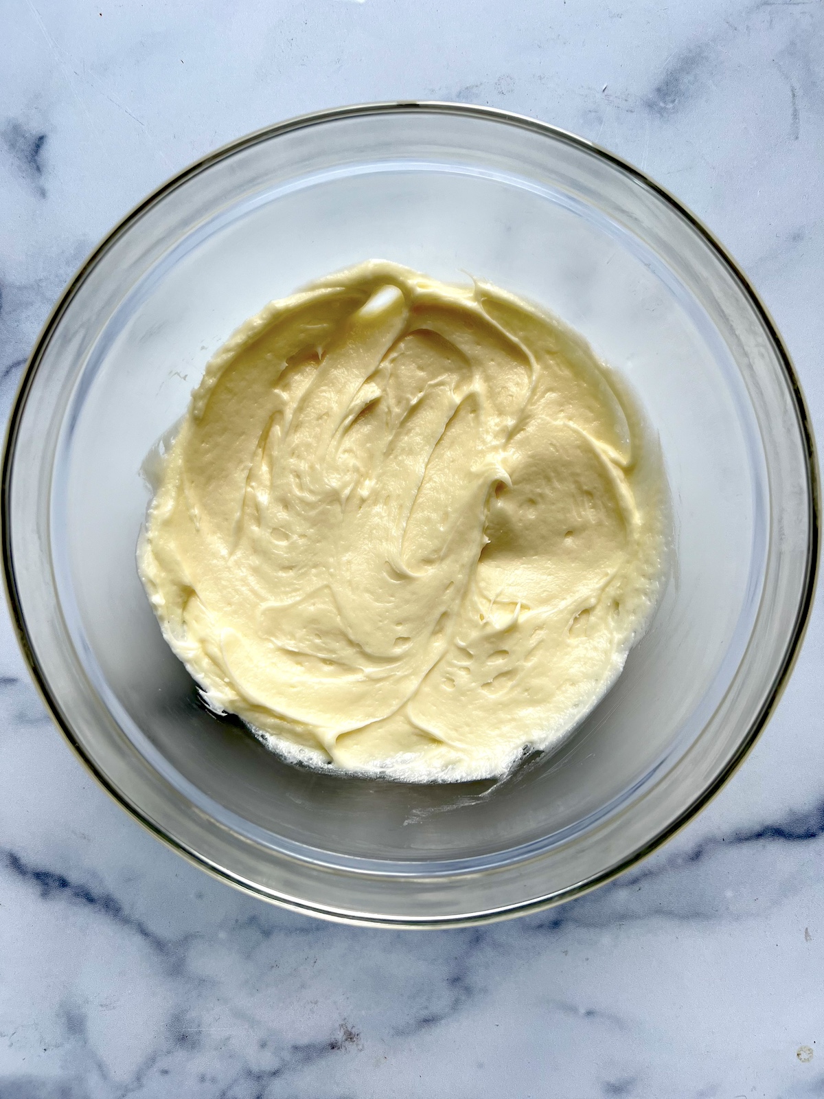 Cream cheese icing in mixing bowl.