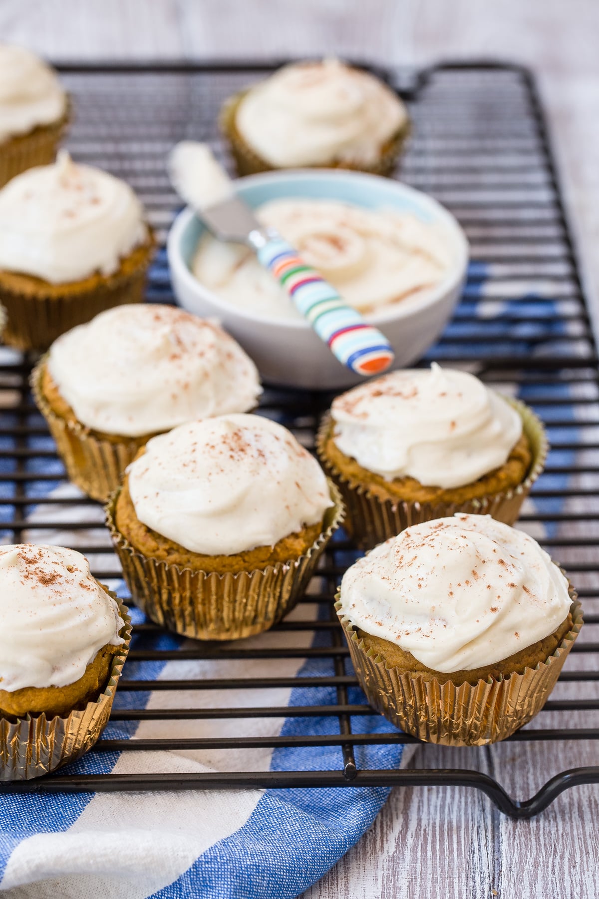 Pumpkin muffins with cream cheese frosting.