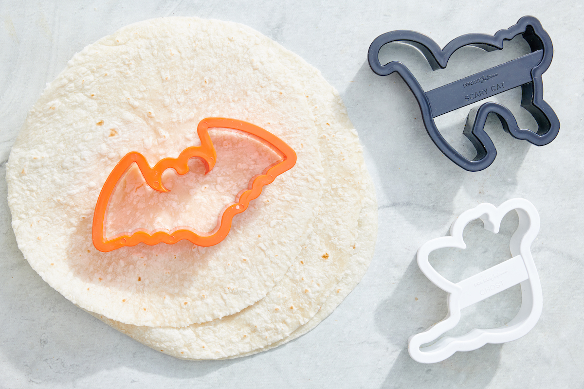 Flour tortillas with halloween shaped cookie cutters.