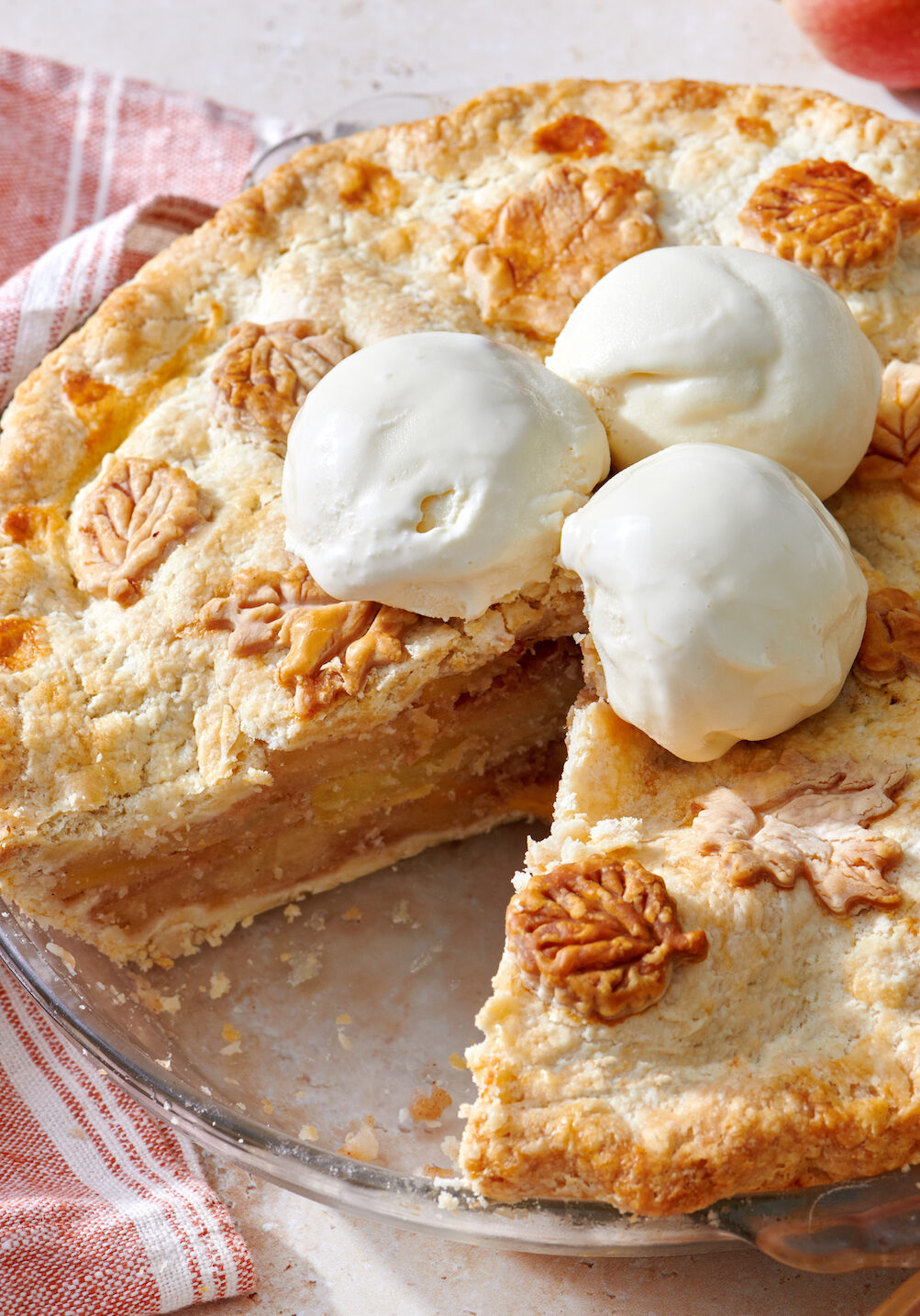 Apple pie with ice cream on top.