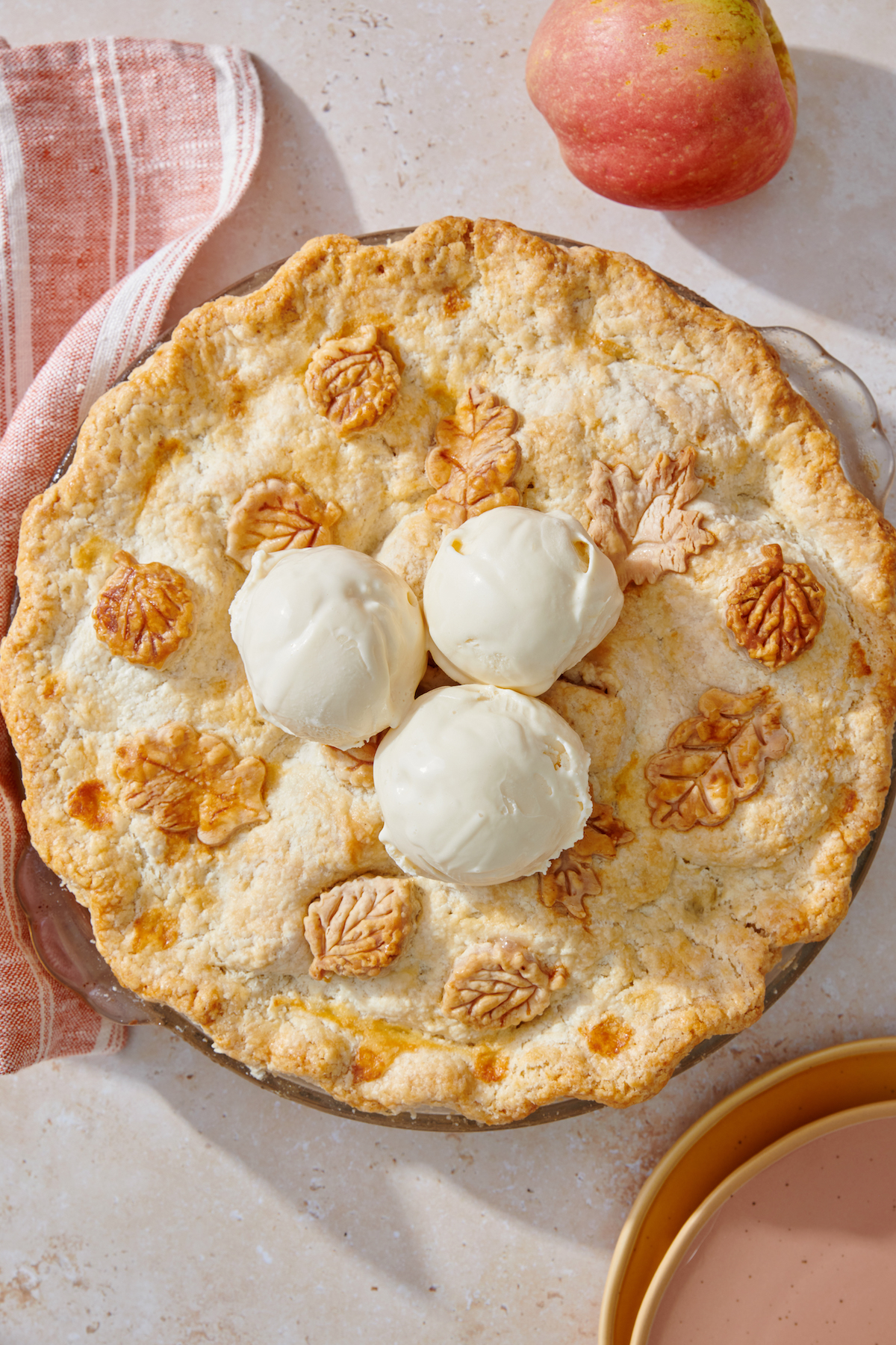 Apple pie topped with ice cream