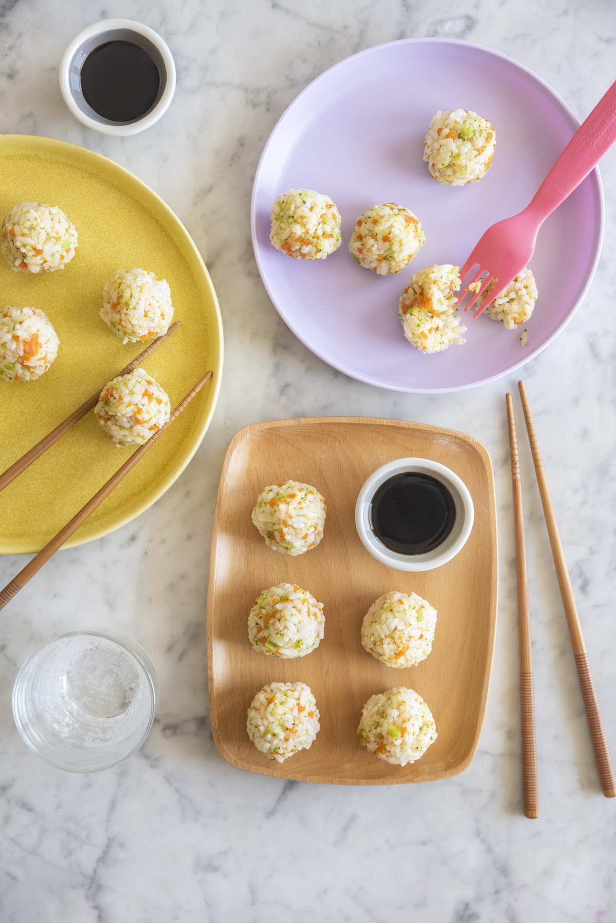 Japanese rice balls served on plates.