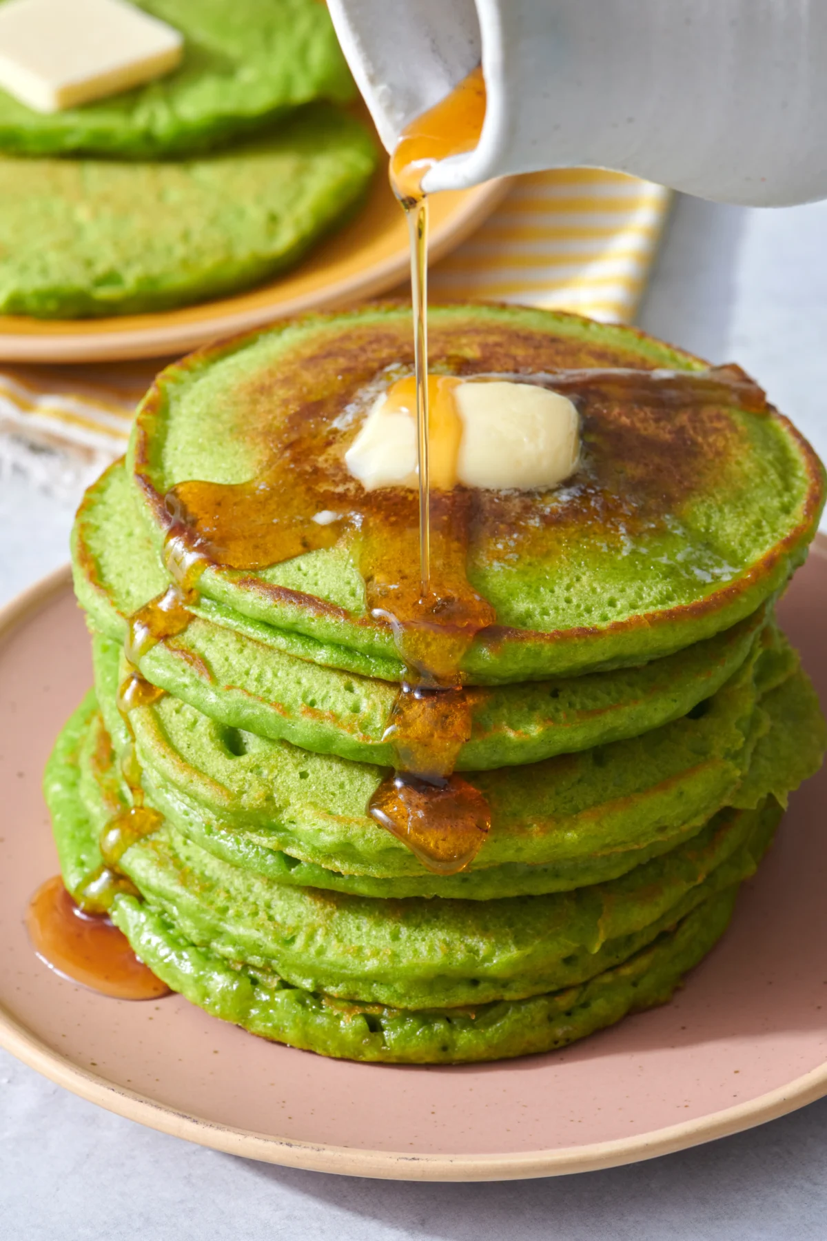 Syrup with spinach pancakes.