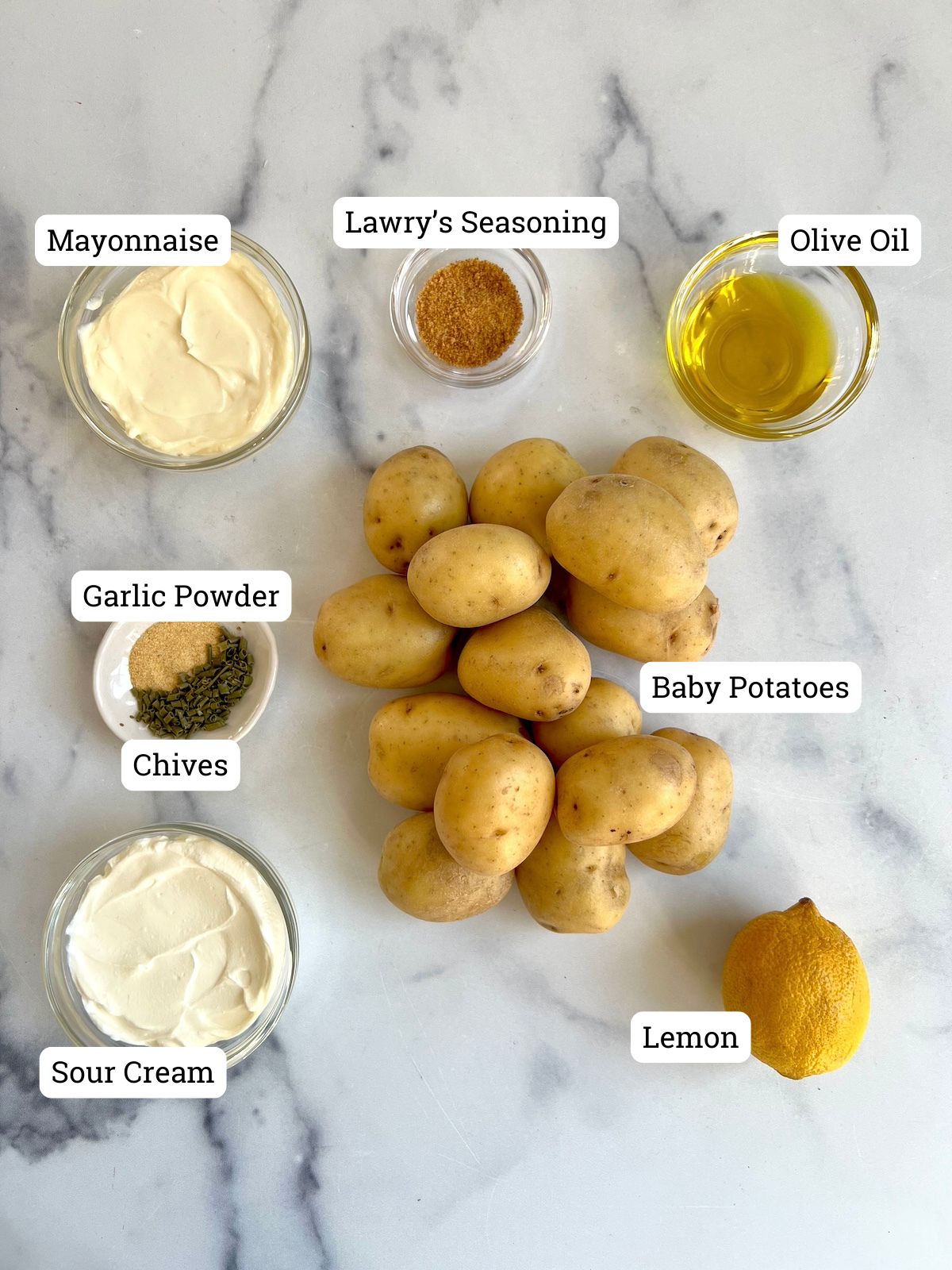 Ingredients needed for air fryer potatoes and creamy garlic dip.