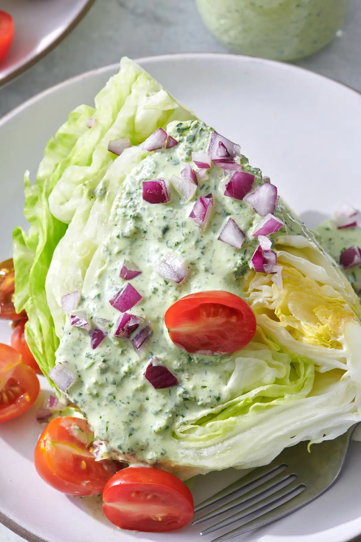 Green Goddess dressing on wedge salad