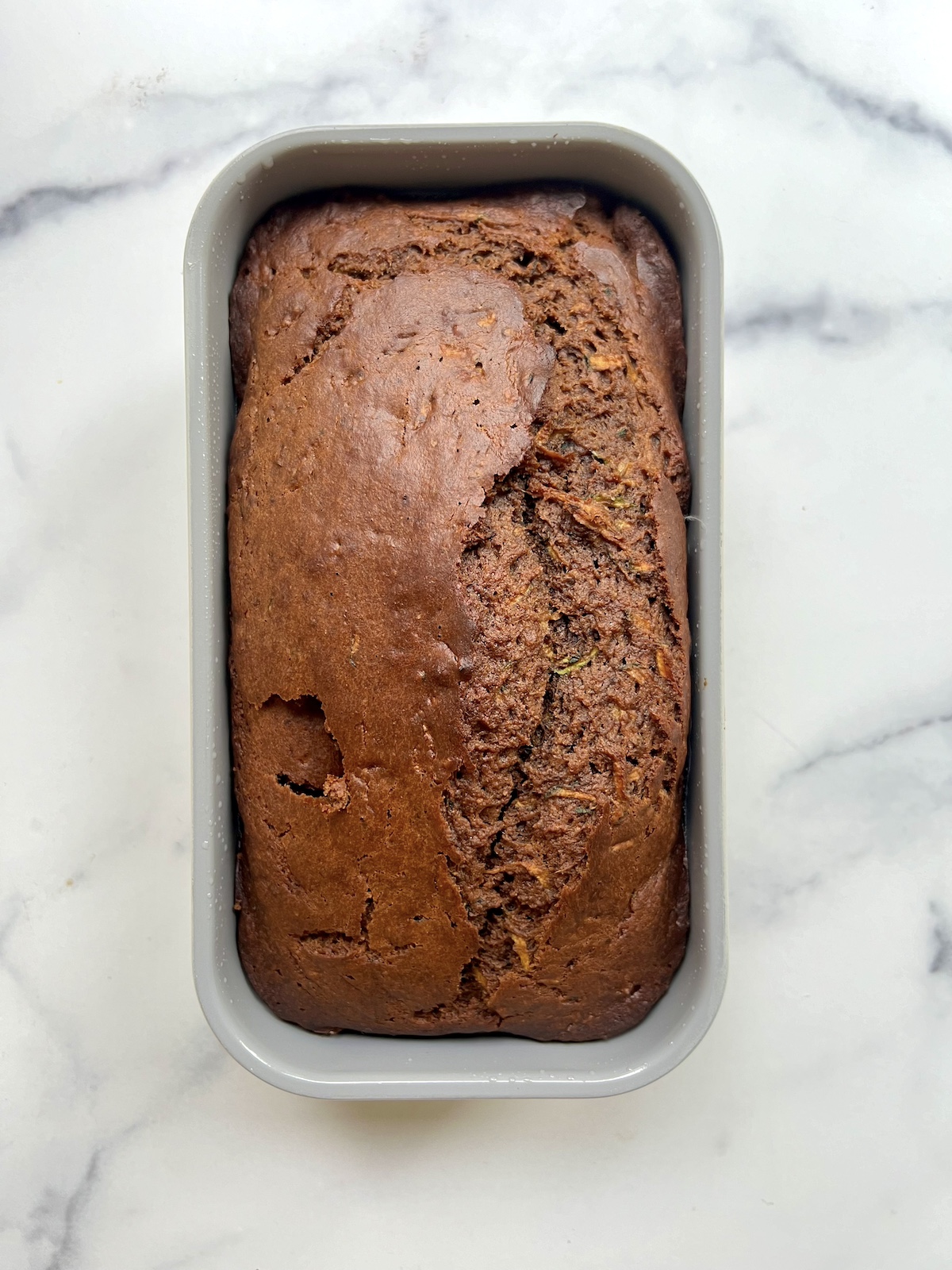 Baked loaf of chocolate zucchini bread.