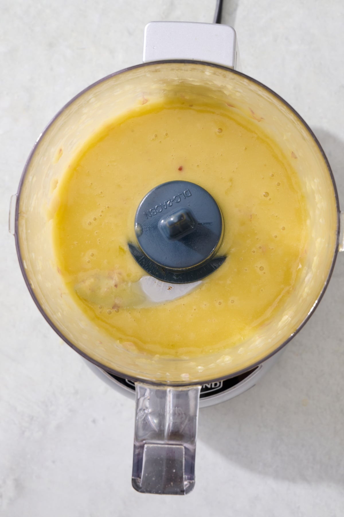 Everyday lemon vinaigrette dressing in food processor.
