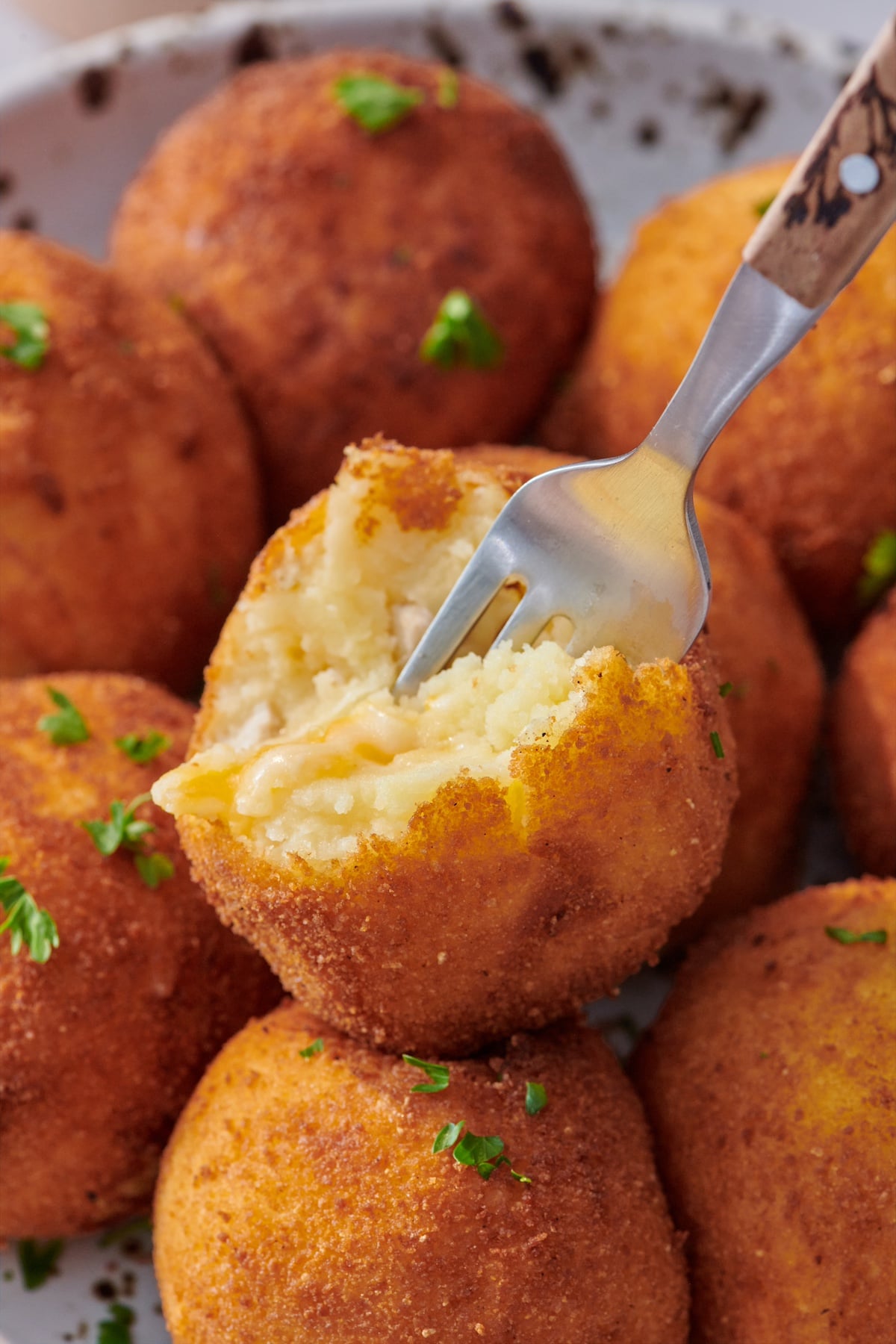 Fork cutting into Turkey Potato Croquettes.