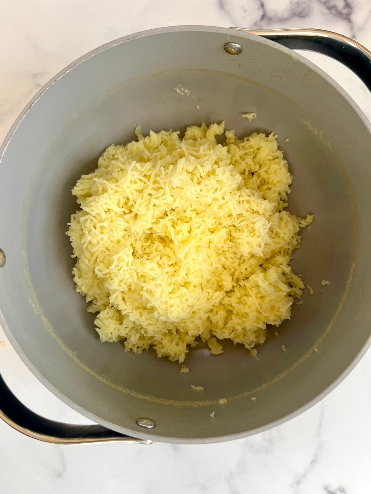 Riced potatoes in a pot.