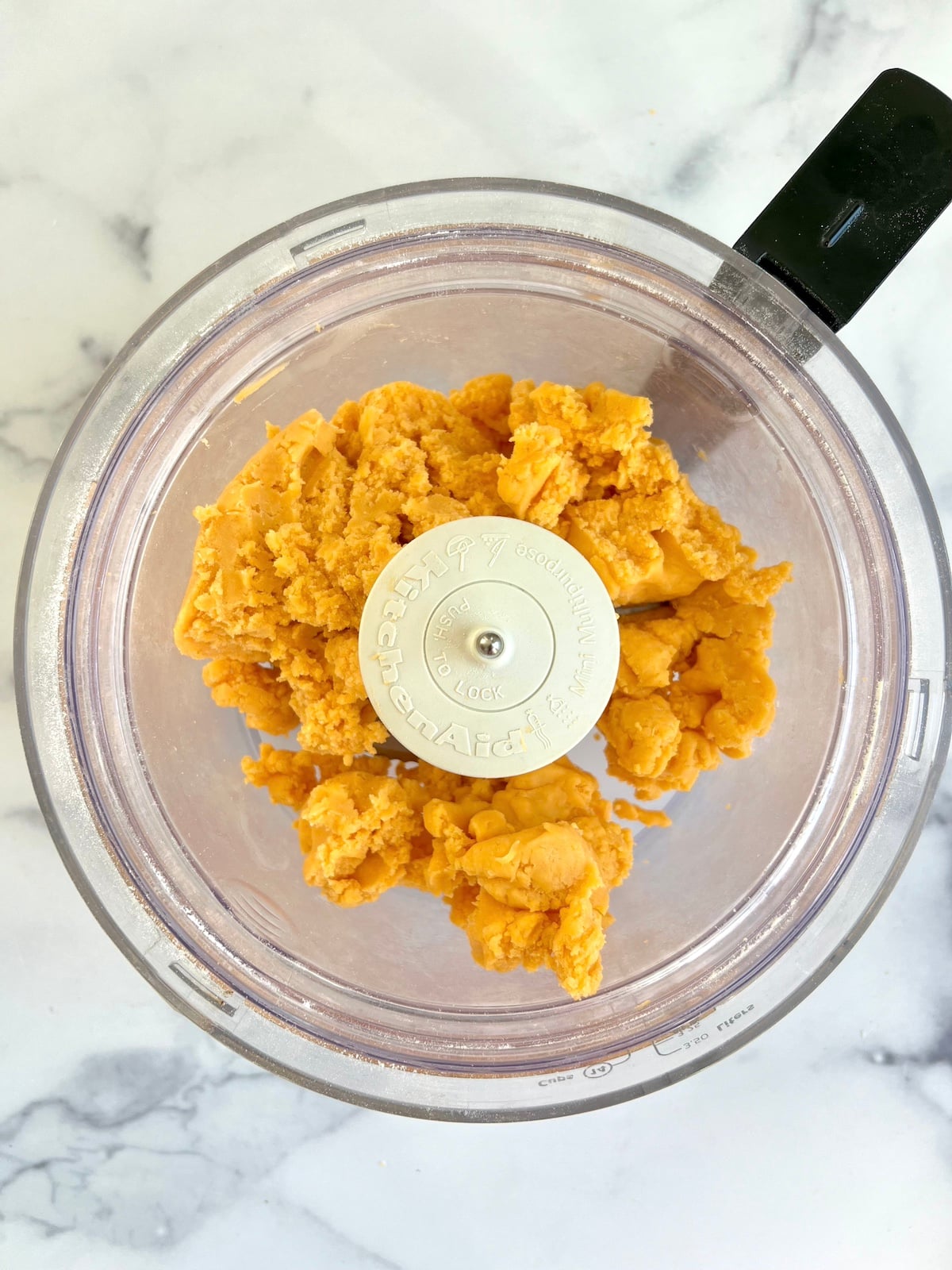 Cheese wafer dough in a food processor.