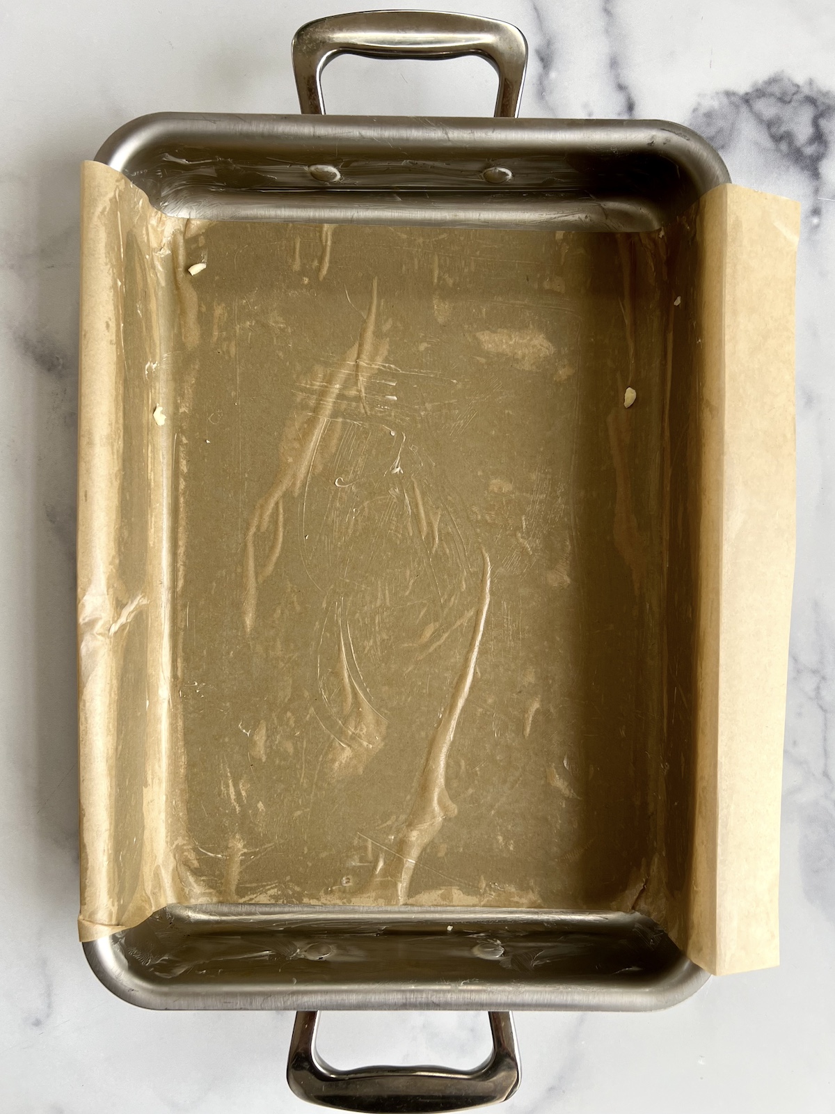 Greased and lined baking dish.