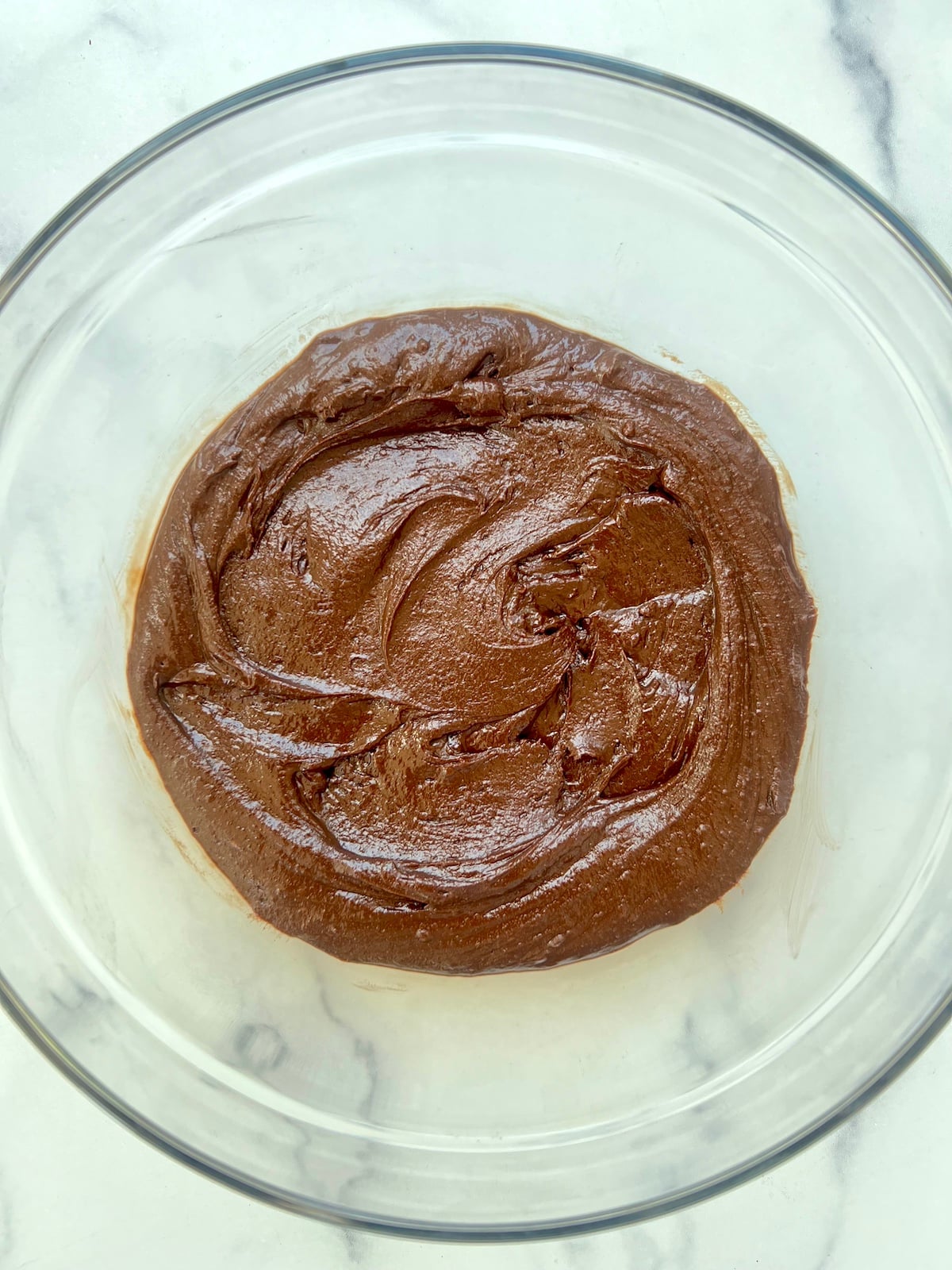 Chocolate cookie dough in a bowl.