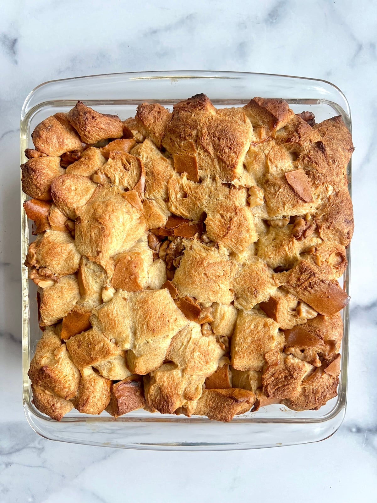 Challah bread pudding baked in a dish.