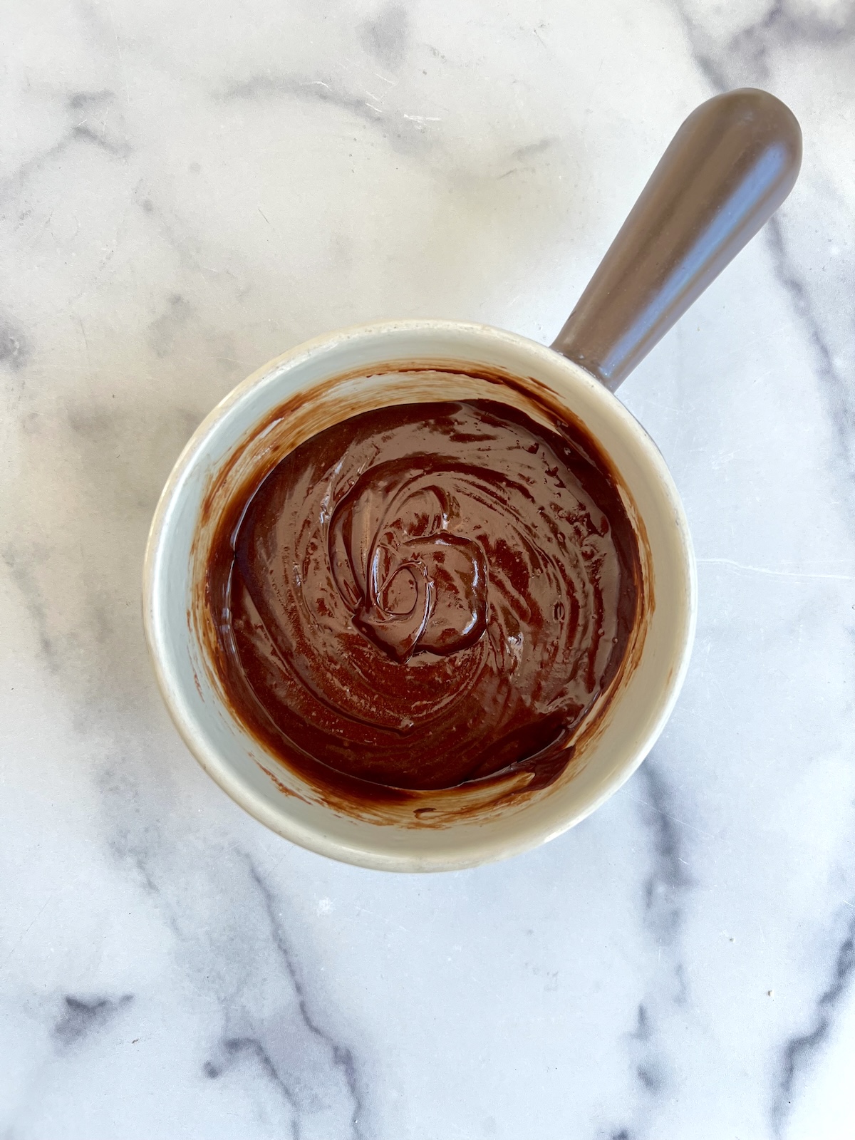 Melted chocolate in a bowl.