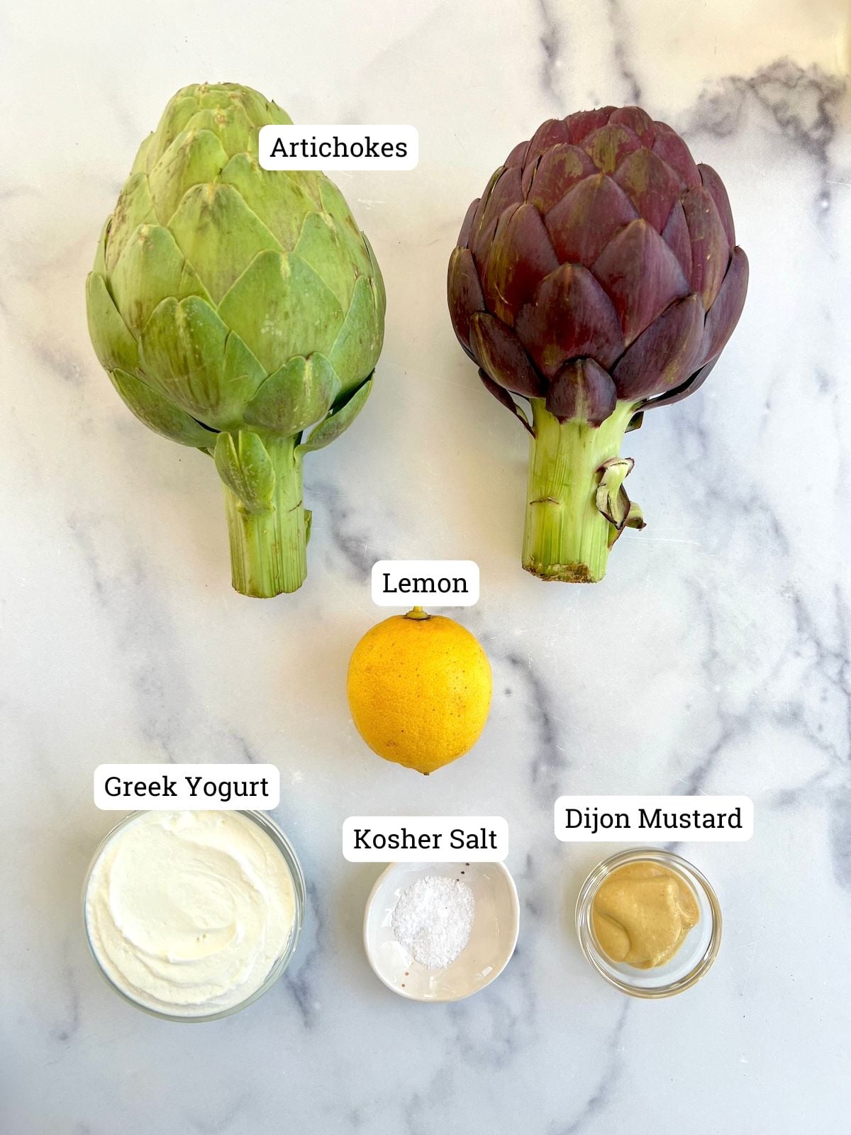 Ingredients for steamed artichokes and lemon yogurt sauce.