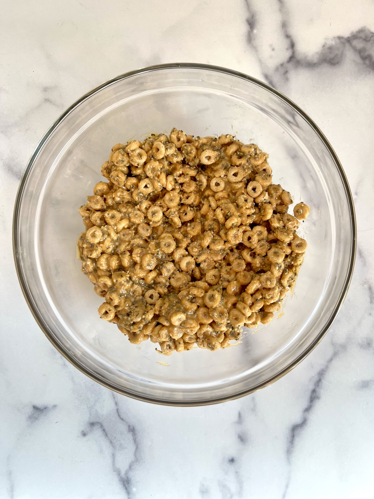 Cereal bar ingredients in a mixing bowl.