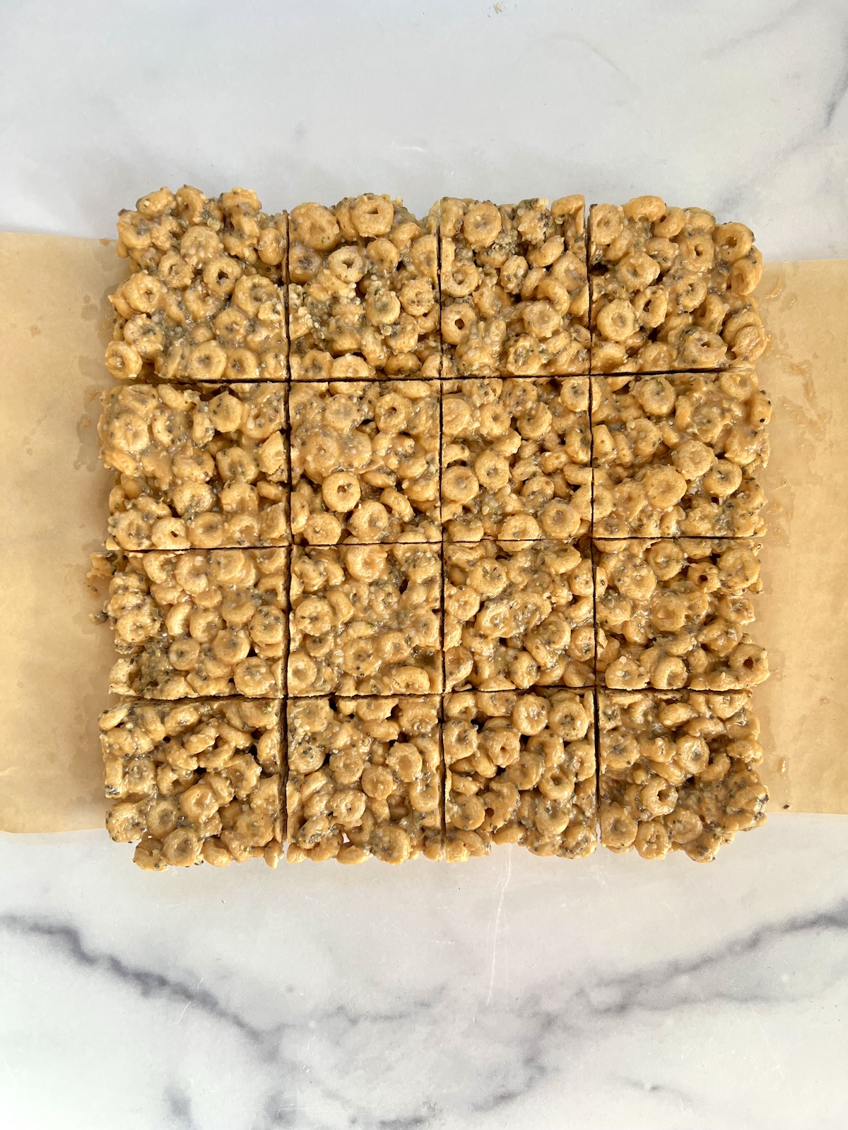 Protein cereal bars on parchment paper.