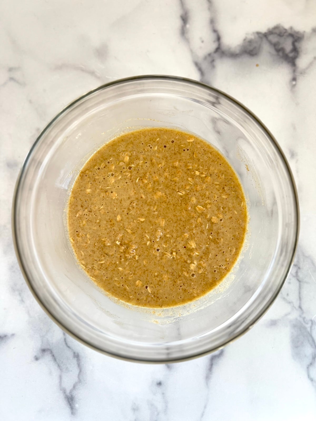 Very berry muffin batter before adding berries in a bowl.