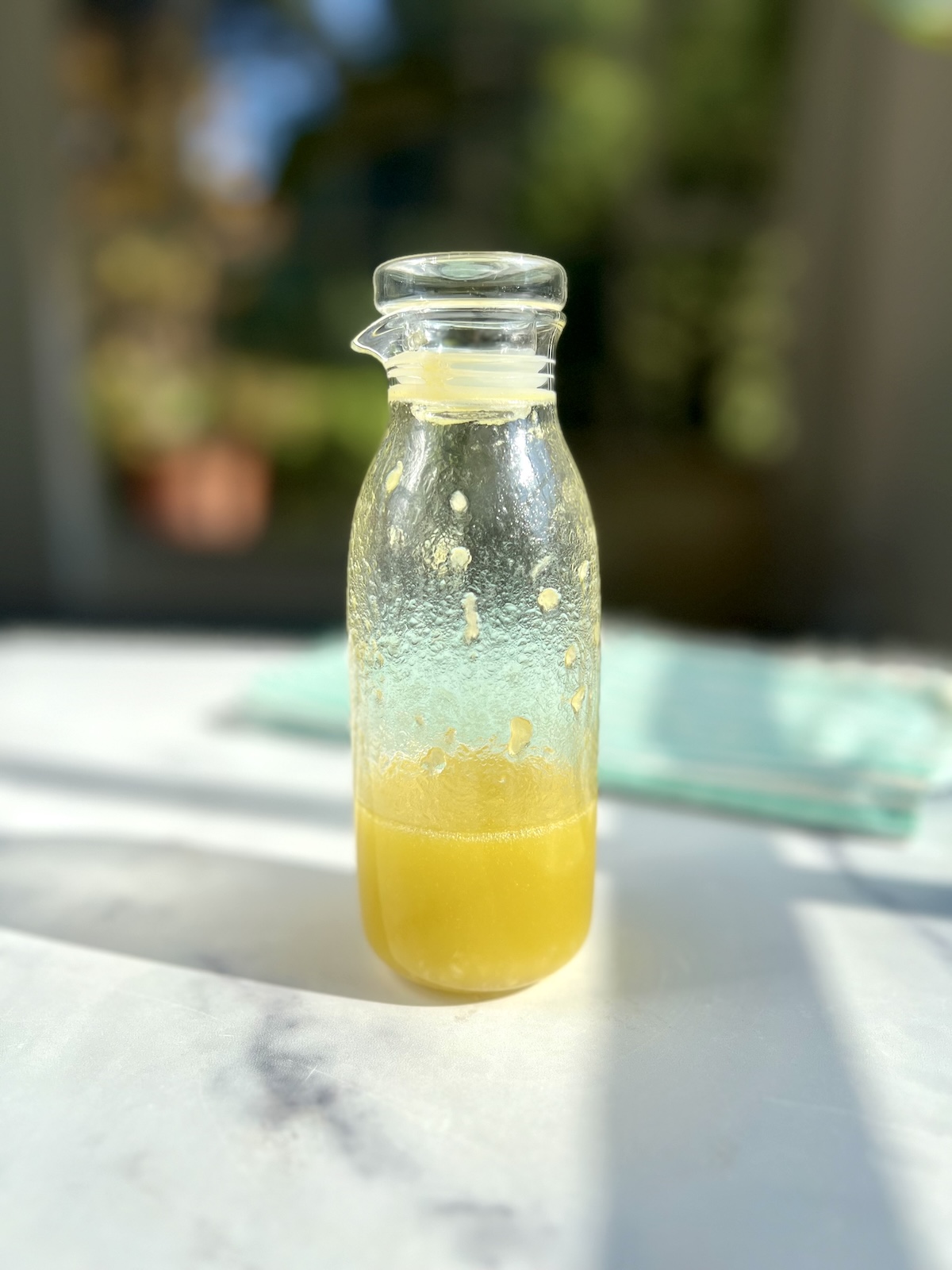 Champagne vinaigrette in a glass jar.