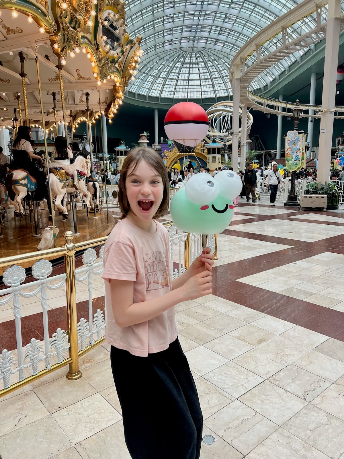 Gemma with big smile and cotton candy.