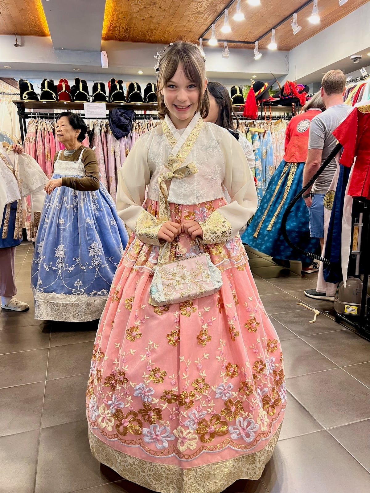 Young girl in traditional hanbok dress.